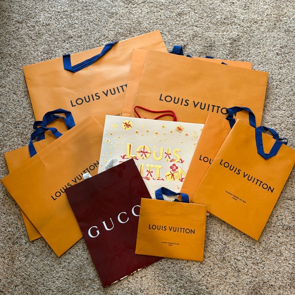 9 Louis Vuitton 1 Gucci shopping bags
